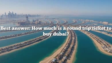 Best answer: How much is a round trip ticket to buy dubai?