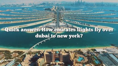 Quick answer: How emirates flights fly over dubai to new york?