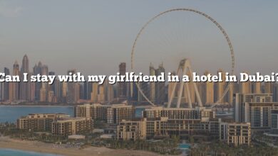 Can I stay with my girlfriend in a hotel in Dubai?