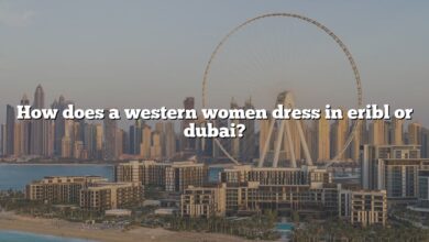 How does a western women dress in eribl or dubai?
