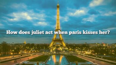 How does juliet act when paris kisses her?
