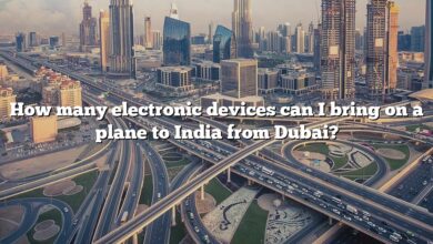 How many electronic devices can I bring on a plane to India from Dubai?
