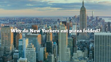 Why do New Yorkers eat pizza folded?