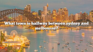 What town is halfway between sydney and melbourne?